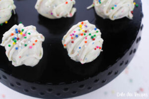 Featured image showing the finished funfetti cake mix cookies truffles ready to be eaten.