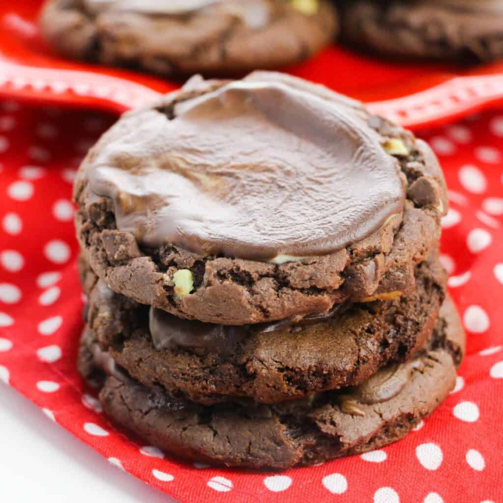 A stack of chocolate mint cookies.