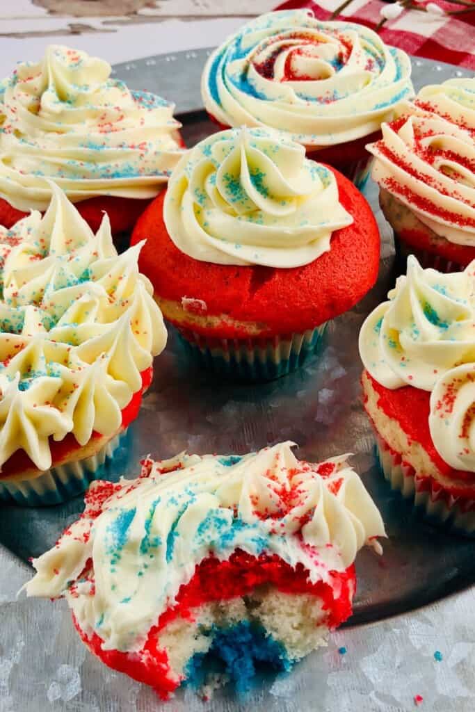 A tray of the red white and blue cupcakes.
