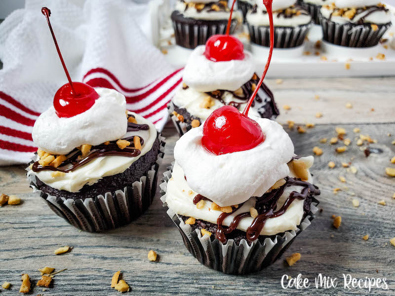A close up of the finished hot fudge sundae cupcakes ready to eat. 
