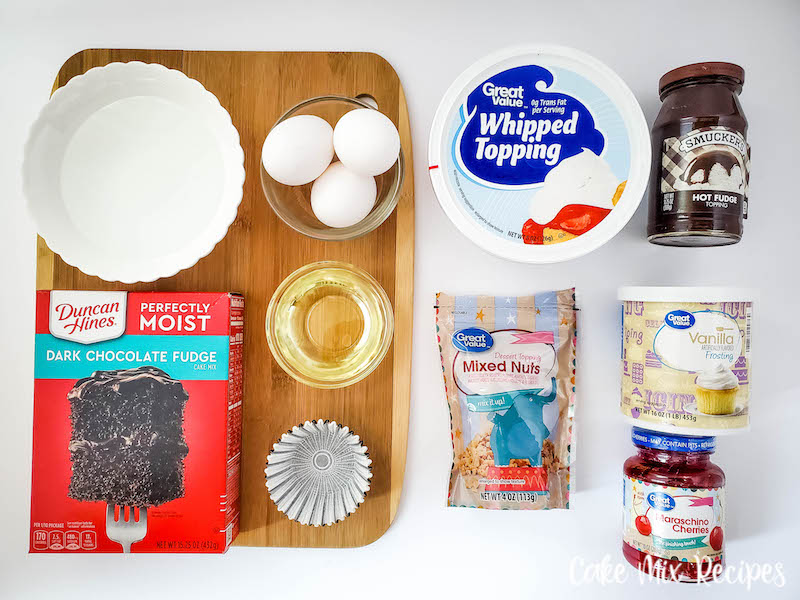 Ingredients needed to make hot fudge sundae cupcakes. 