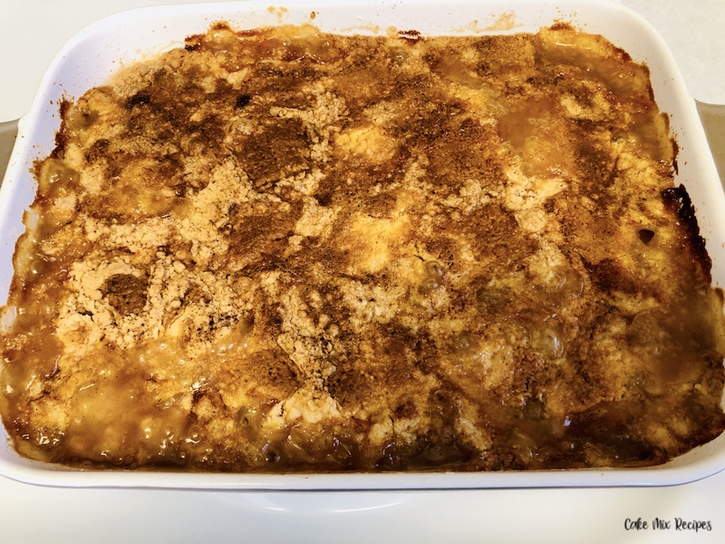 Baked dump cake with peaches ready to be cooled and served. 