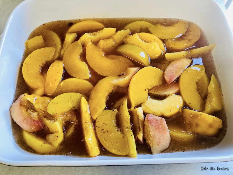 Peaches poured into the pan. 