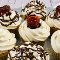 Featured image showing the finished maple baourbon cupcakes ready to eat.