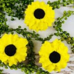 Three oreo sunflower cupcakes.