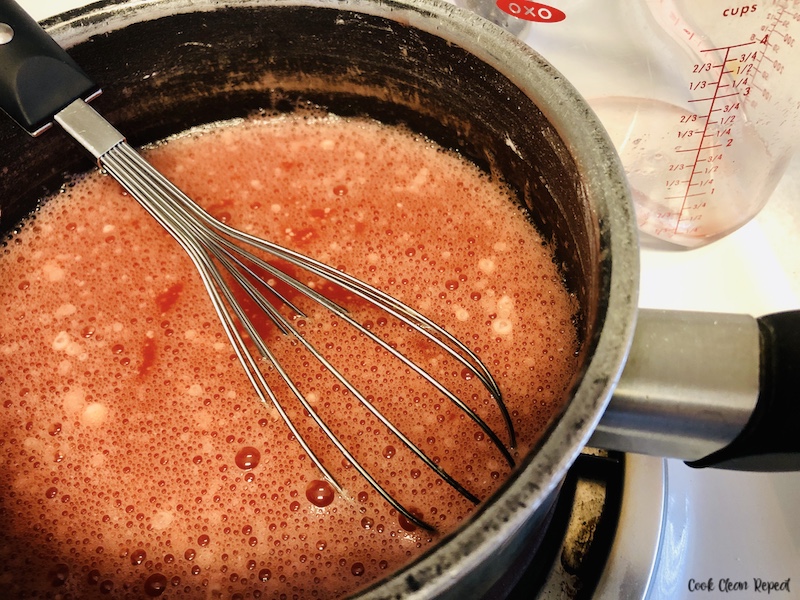 Sauce pan with juice, lemon juice, cornstarch and sugar. 