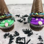 a pair of the finished halloween spooky witch cupcakes ready to eat.