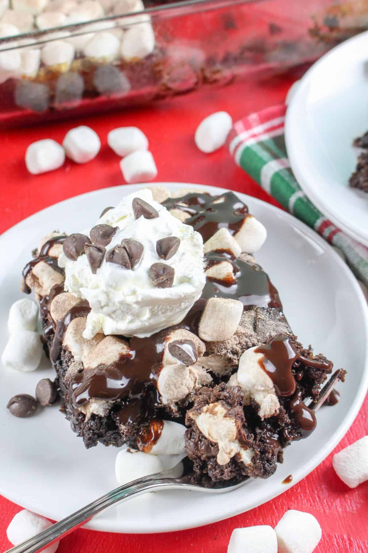A slice of hot cocoa chocolate cake dump cake.