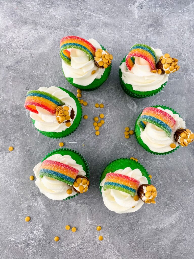 overhead shot of 6 Rainbow St. Patrick's Day Cupcakes
