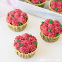rosette cupcakes on a table and in a serving tray