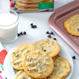 chocolate chip cookies made with pancake mix served on a plate with a glass of milk