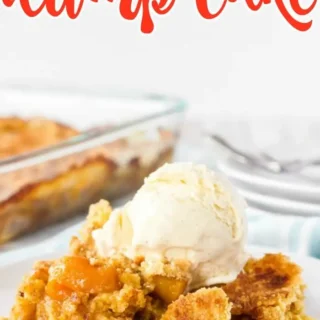 peach dump cake cobbler topped with vanilla ice cream and served on a plate