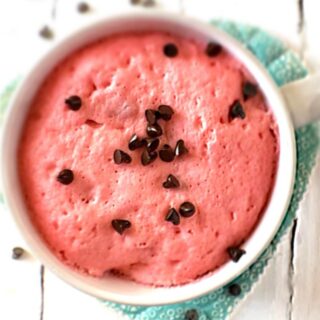strawberry mug cake topped with chocolate chips