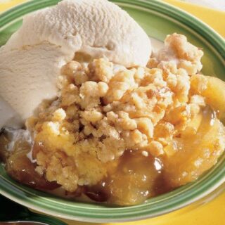 apple cobbler cake with a side of vanilla ice cream