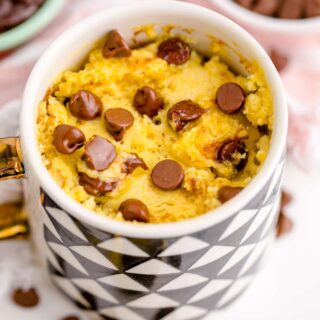 chocolate chip mug cake topped with chocolate chips