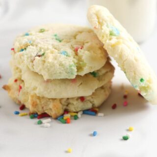 funfetti cake mix cookies staked with rainbow sprinkles