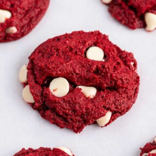 red velvet cake mix cookies topped with white chocolate chips
