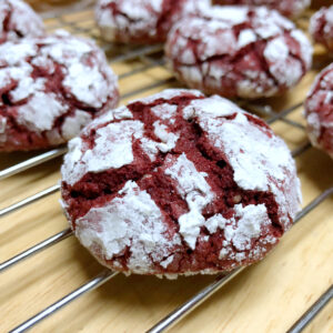 red velvet crinkle cookies with cake mix topped with powdered sugar