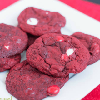 red velvet cake mix cookies served on a plate with white chocolate chips