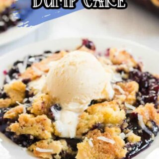 Plate of blueberry dump cake with vanilla ice cream on top