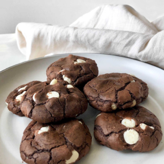 brownie mix cookies with white chocolate chips on a white plate