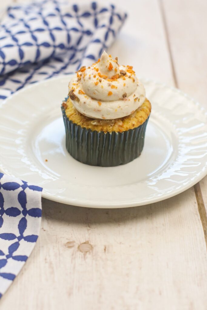 Butterfinger Cupcake on a white plate 