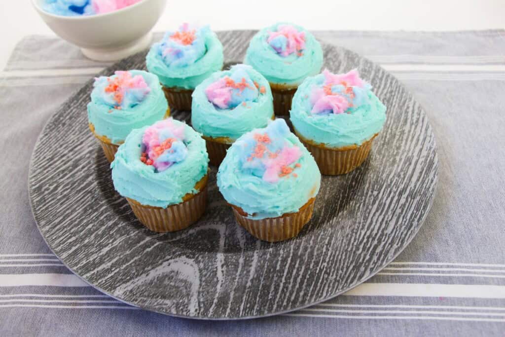 A platter of fun cotton candy cupcakes.