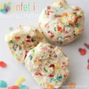 the inside of a delicious funfetti breakfast muffin with rainbow sprinkles all around