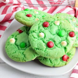 Green Christmas Cake mix cookies with red, green and white m&ms and white chocolate chips baked in