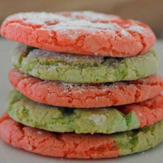 red and green christmas cake mix cookies with white sugar on top
