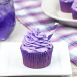 A single grape soda cupcakes on a plate.