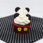 Two adorable mickey mouse cupcakes.