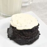 An oreo cupcake on a white square plate.