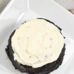 A chocolate dessert with white icing.
