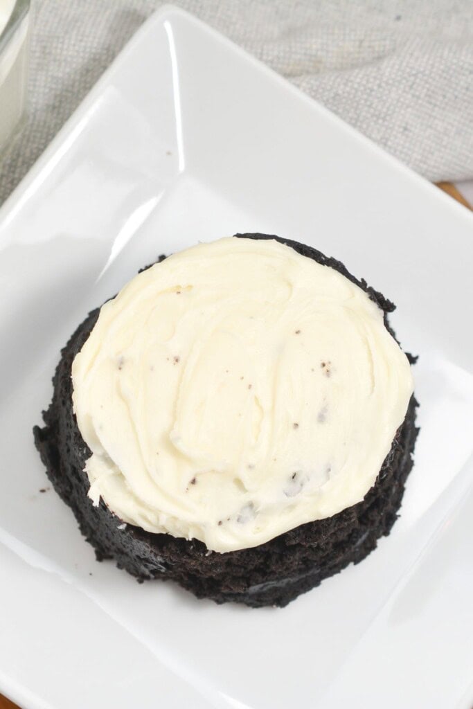 A chocolate dessert with white icing.