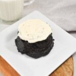 A microwave oreo cake on a white plate.