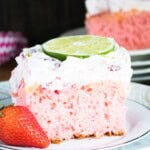 A slice on a white plate with one in the background.