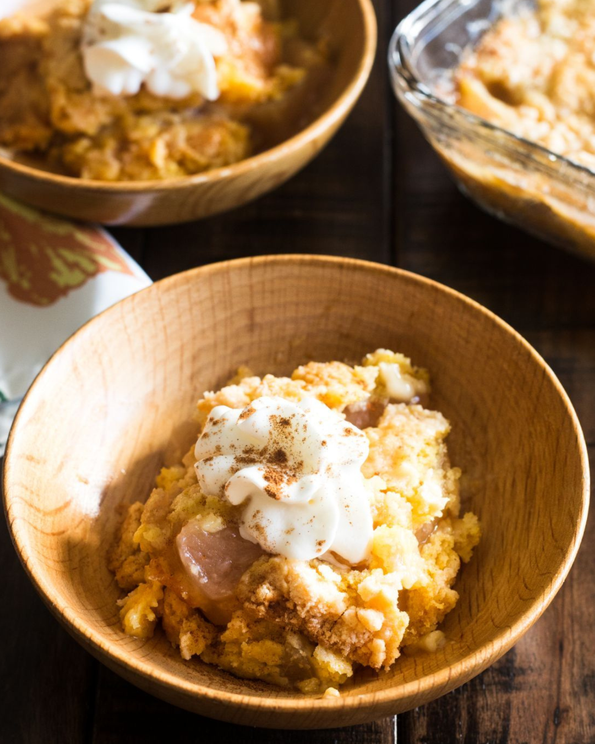 apple spice dump cake in brown bowls