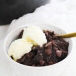 A spoon in the chocolate lava cake.