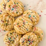 A platter of funfetti cookies with icing.