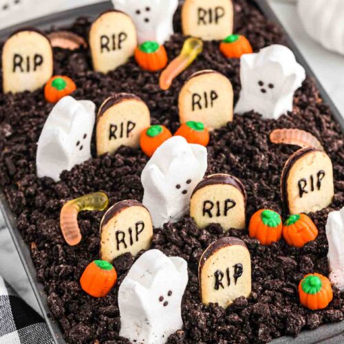 Dirt cake graveyard with delicious ghosts, worms, and cookie gravestones