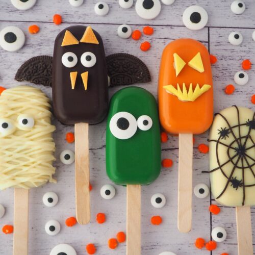 Various Halloween cakesicles including a mummy, bat, and more