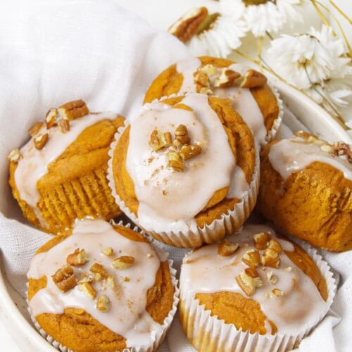 Pumpkin muffins with glaze and pecans