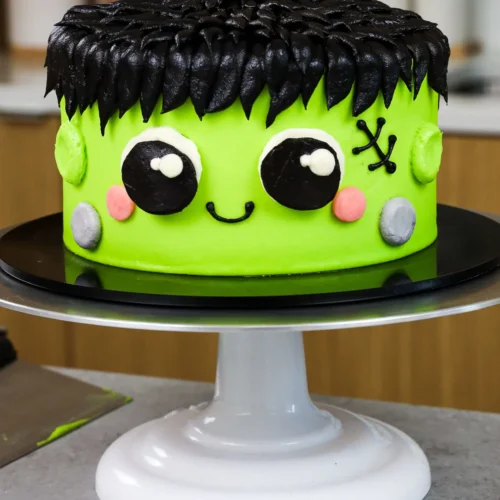 Cute green Frankenstein cake with