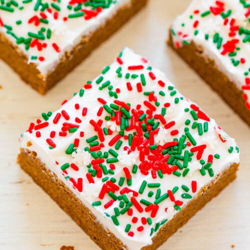 Gingerbread cookie bars with cream cheese icing and sprinkles