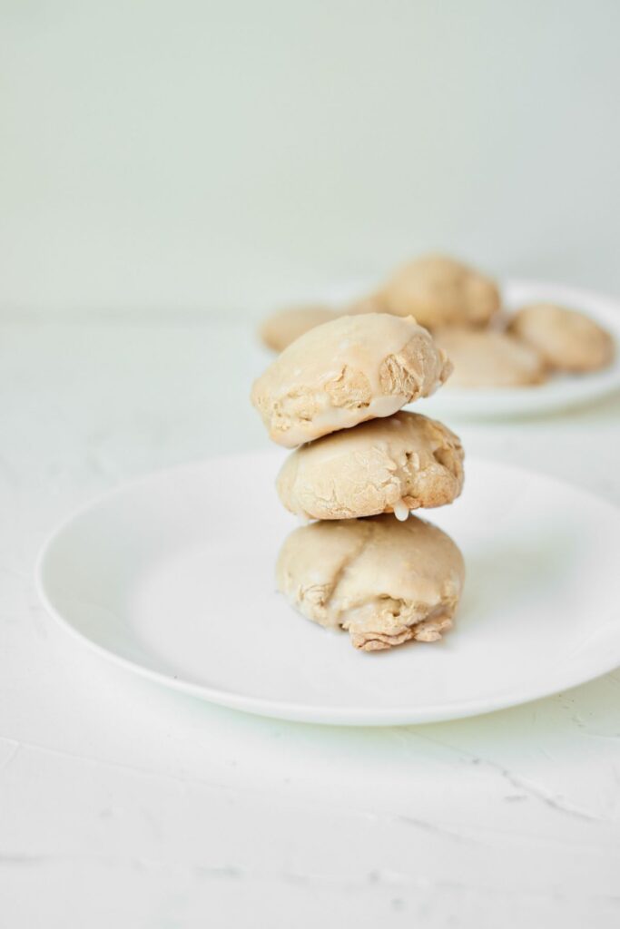 Stacked Butter Pecan Cake Mix Cookies on a plate. 