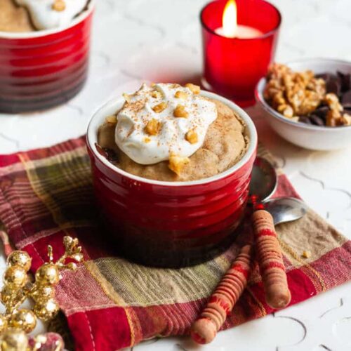Gingerbread mug cake with whipped cream and chocolate chips