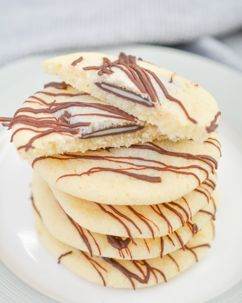 andes candy cookies stacked on a plate.