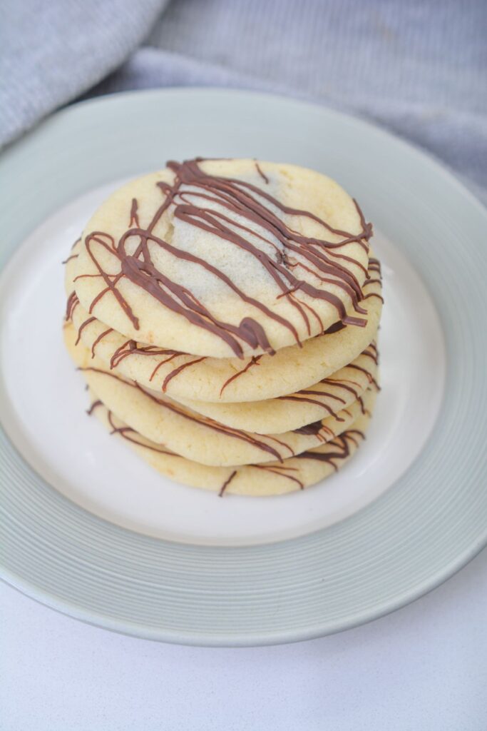 andes candy cookies stacked on a plate.