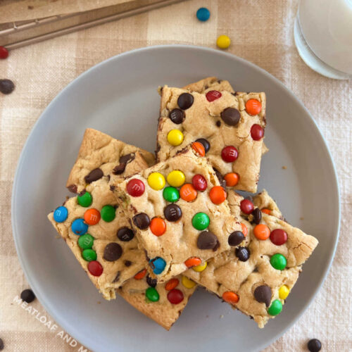 Chewy chocolate chip cookie bars with M&Ms